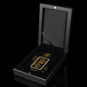 Black wooden gift box for a single gold bar in blister packaging
