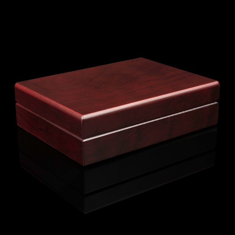 Mahogany wooden gift box for a single gold bar in blister packaging