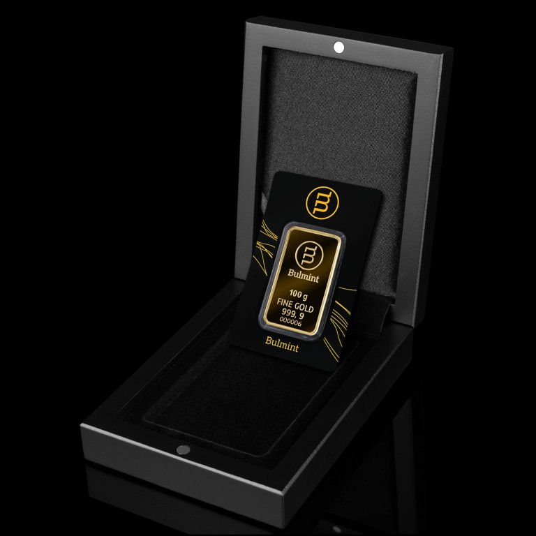 Black wooden gift box for a single gold bar in blister packaging